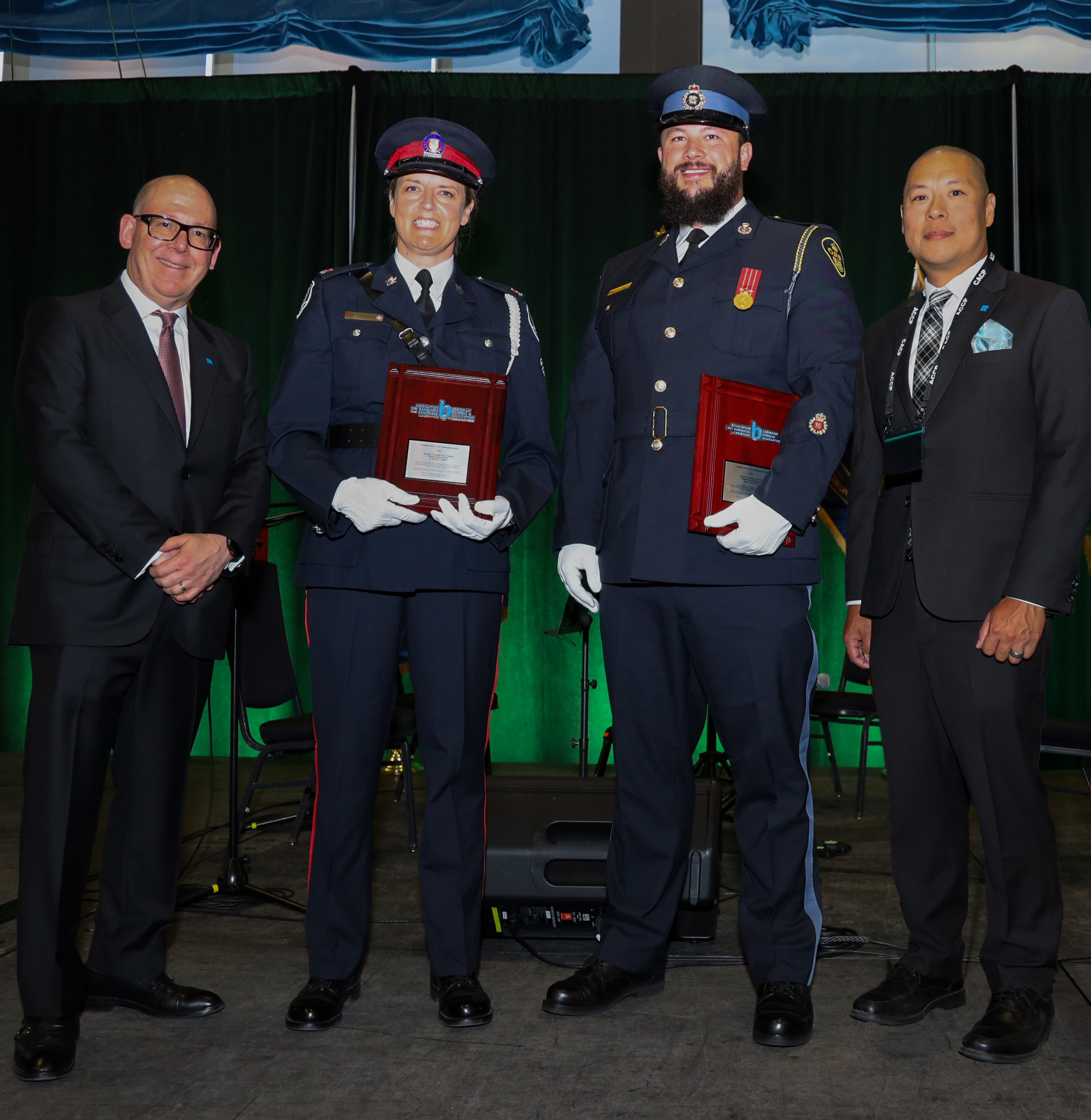 CBA President and CEO Anthony G. Ostler, Detective Constable Ewa Consack, Toronto Police Service, Detective Constable Lukas Yip, Ontario Provincial Police and CBA Director, Financial Crimes, Ryan Ku