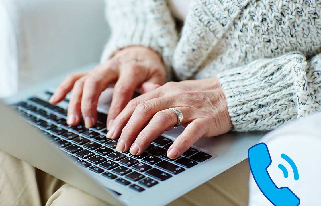 hands typing on a laptop